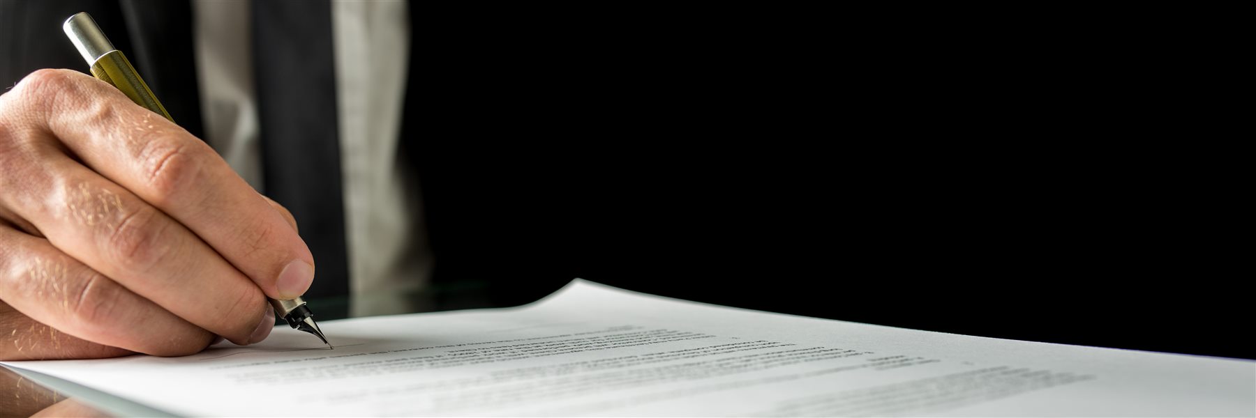 A real estate professional reviewing documents